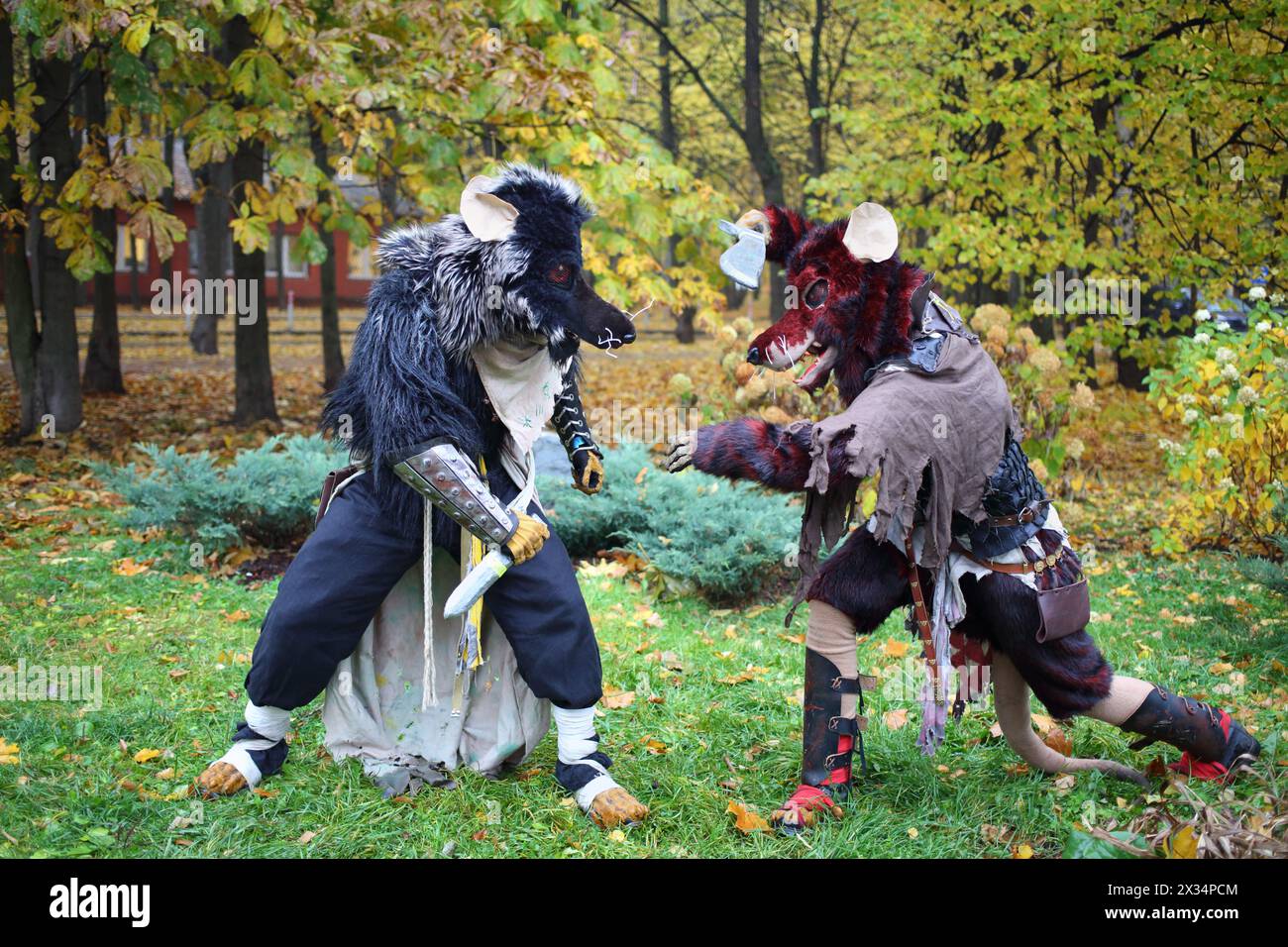 MOSCOW - OCT 12, 2014: Cosplayers dressed as rats fight with each other ...