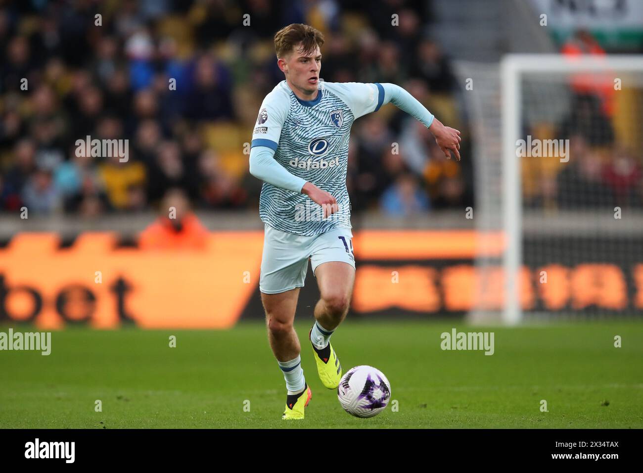 Alex Scott of Bournemouth breaks with the ball during the Premier League match Wolverhampton Wanderers vs Bournemouth at Molineux, Wolverhampton, United Kingdom, 24th April 2024  (Photo by Gareth Evans/News Images) Stock Photo