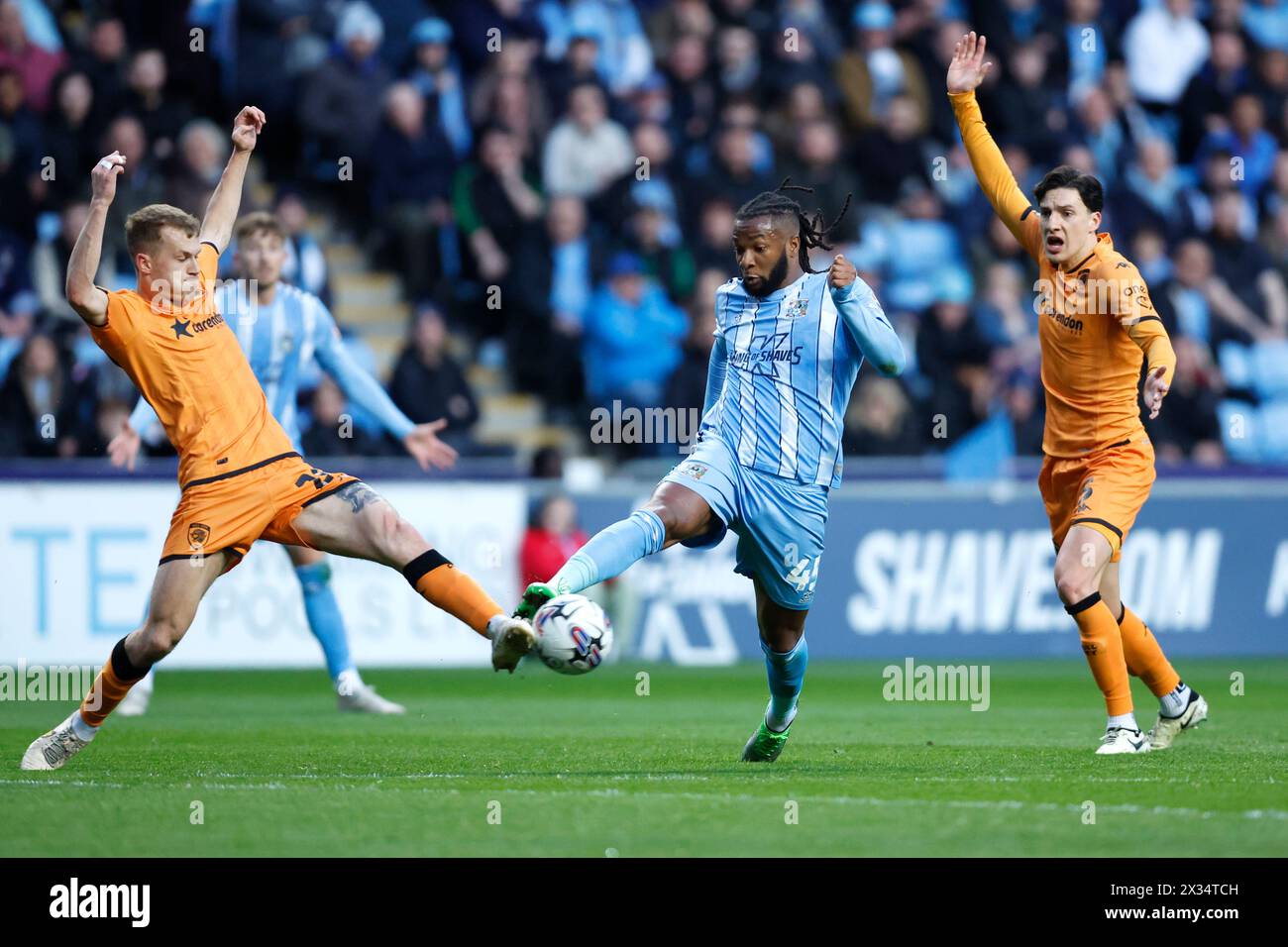 Coventry City's Victor Torp (centre) in action during the Sky Bet Championship match at Coventry Building Society Arena, Coventry. Picture date: Wednesday April 24, 2024. Stock Photo