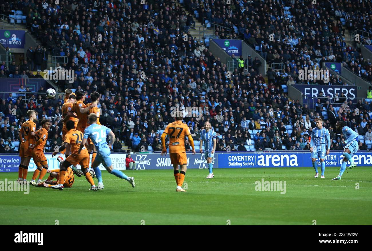 Coventry City's Kasey Palmer (right) scores their side's first goal of the game from a free-kick during the Sky Bet Championship match at Coventry Building Society Arena, Coventry. Picture date: Wednesday April 24, 2024. Stock Photo