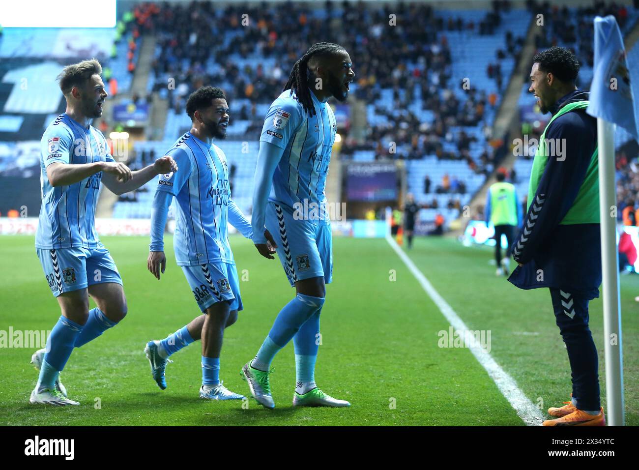 Coventry City's Kasey Palmer (centre) celebrates scoring their side's first goal of the game with team-mates during the Sky Bet Championship match at Coventry Building Society Arena, Coventry. Picture date: Wednesday April 24, 2024. Stock Photo