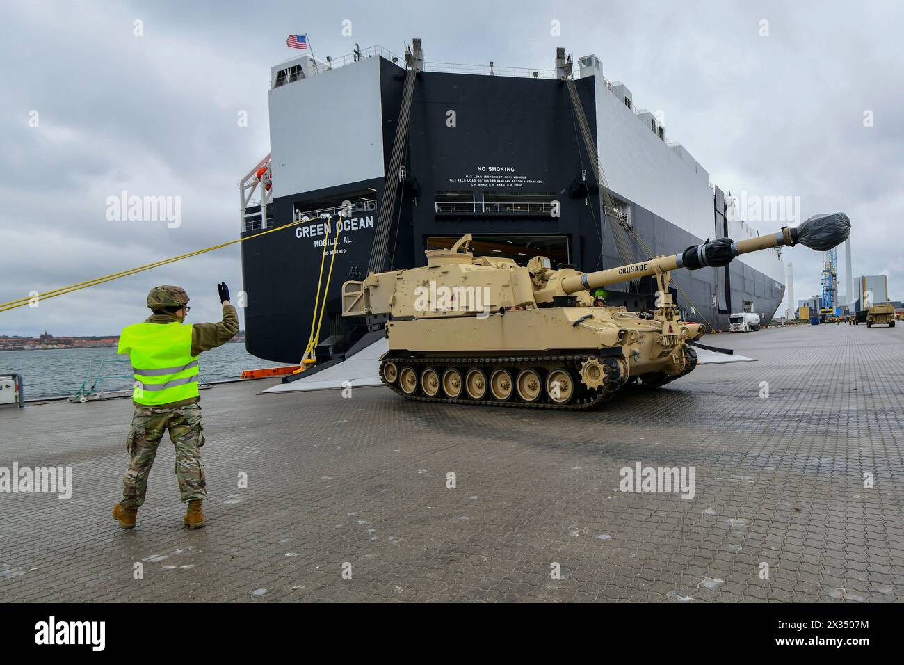 Kalundborg, Denmark. 19 April, 2024. A U.S Army self-propelled howitzer rolls off the MV Green Ocean, part of more than 900 pieces of military equipment that are offloaded for exercise Steadfast Defender 24 at the port of Kalundborg, April 19, 2024, in Kalundborg, Denmark.  Credit: Elena Baladelli/US Army Photo/Alamy Live News Stock Photo