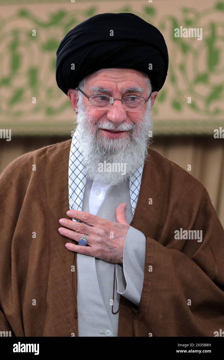 Tehran, Iran. 24th Apr, 2024. Iranian Supreme Leader Ayatollah ALI KHAMENEI meeting with a group