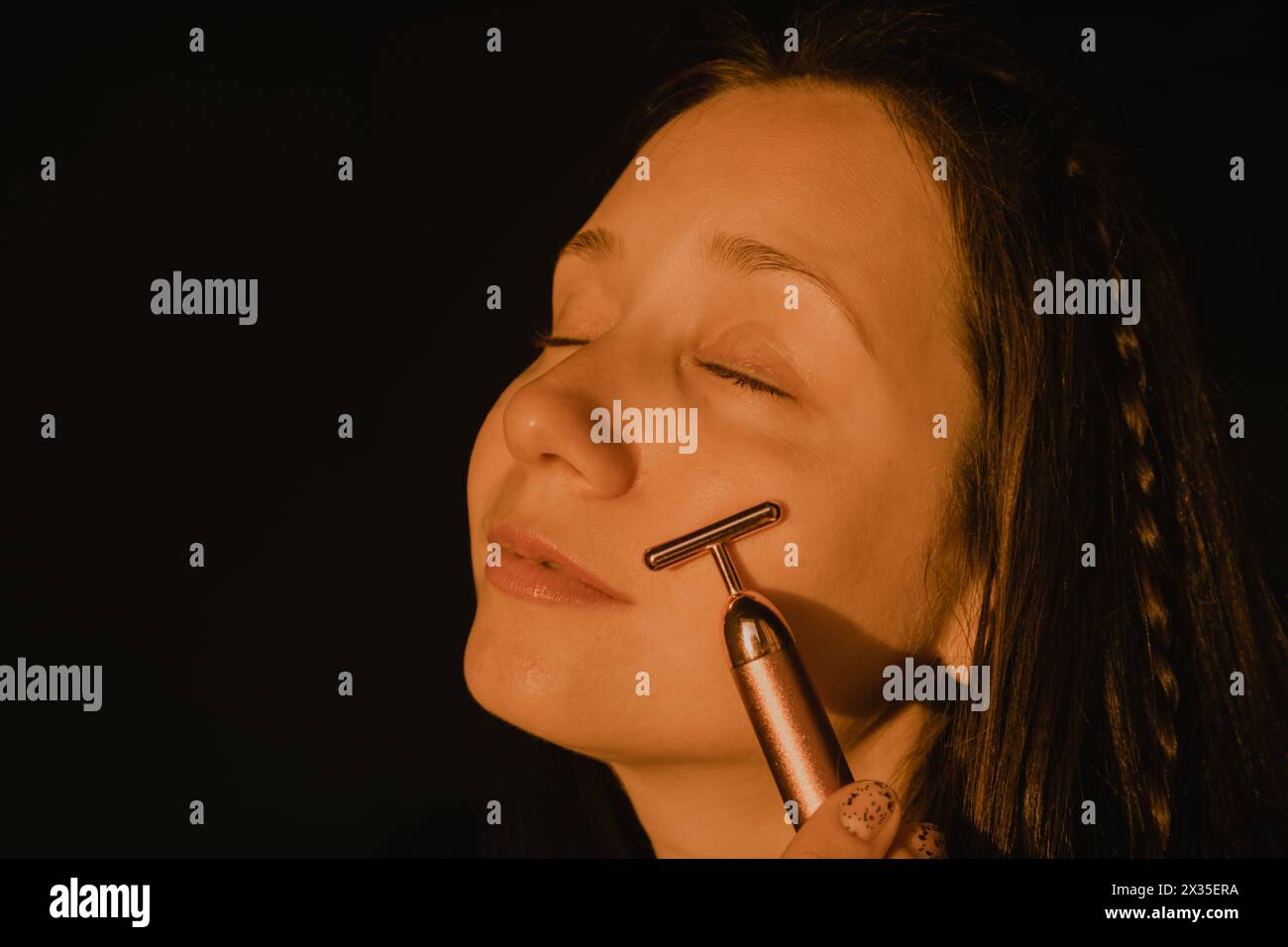 using vibrating massager on face Vibrating Facial Massager main image 0