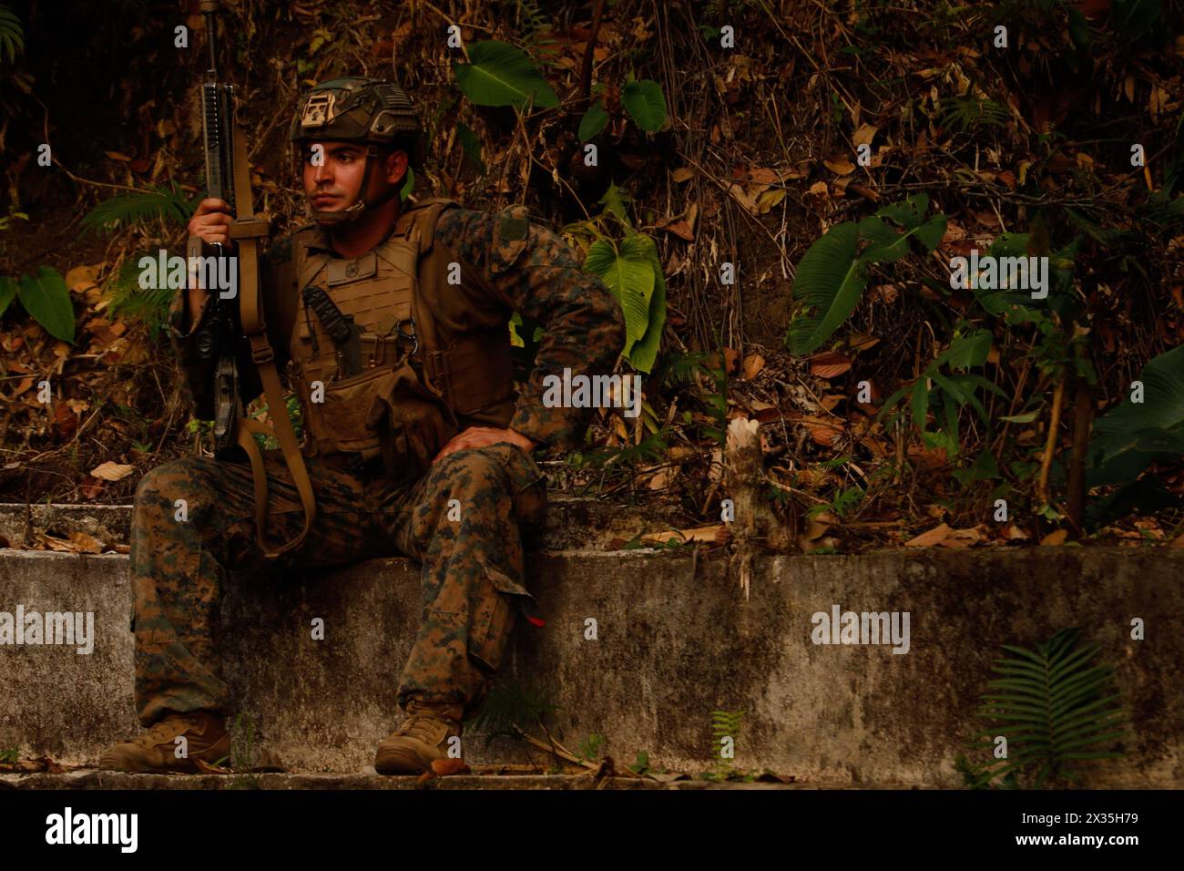 U.S. Marine Corps Lance Cpl. Carlos Navarrete, a rifleman with Echo Company, 2nd Battalion, 1st Marine Regiment, 1st Marine Division, participates in jungle operations and survival training during Marine Exercise 2024 near Cotabato City, Mindanao, Philippines, April 12, 2024. MAREX 2024 is a bilateral exercise between the U.S. Marine Corps and the Philippine Marine Corps designed to further enhance relationships, interoperability, and combined arms capabilities in a realistic training environment. Navarrete is a native of Arizona. (U.S. Marine Corps photo by Sgt. Ryan Hageali) Stock Photo