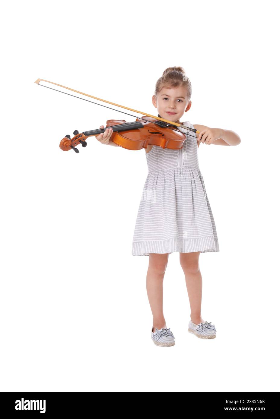 Little girl playing violin on white background Stock Photo - Alamy
