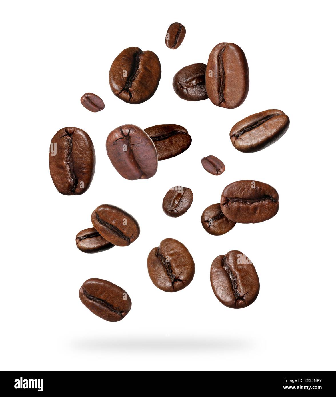 Roasted coffee beans falling on white background Stock Photo - Alamy