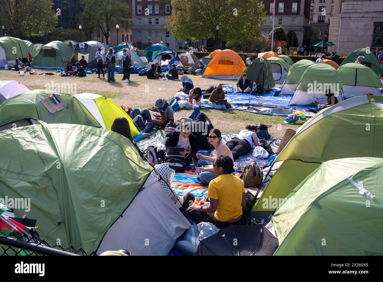 NEW YORK, NEW YORK - APRIL 24: Encampment occupied by pro-Palestinian protesters on the campus of Columbia University on April 24, 2024 in New York City. The Popular Front for the Liberation of Palestine and a senior Hamas leader declared their support for the unsanctioned tent encampments roiling Columbia University and other elite American universities. Speaker of the House Mike Johnson visited the campus as school administrators and pro-Palestinian student protesters made progress on negotiations after the school set a midnight deadline for students to disband the encampment, and agreed on Stock Photo