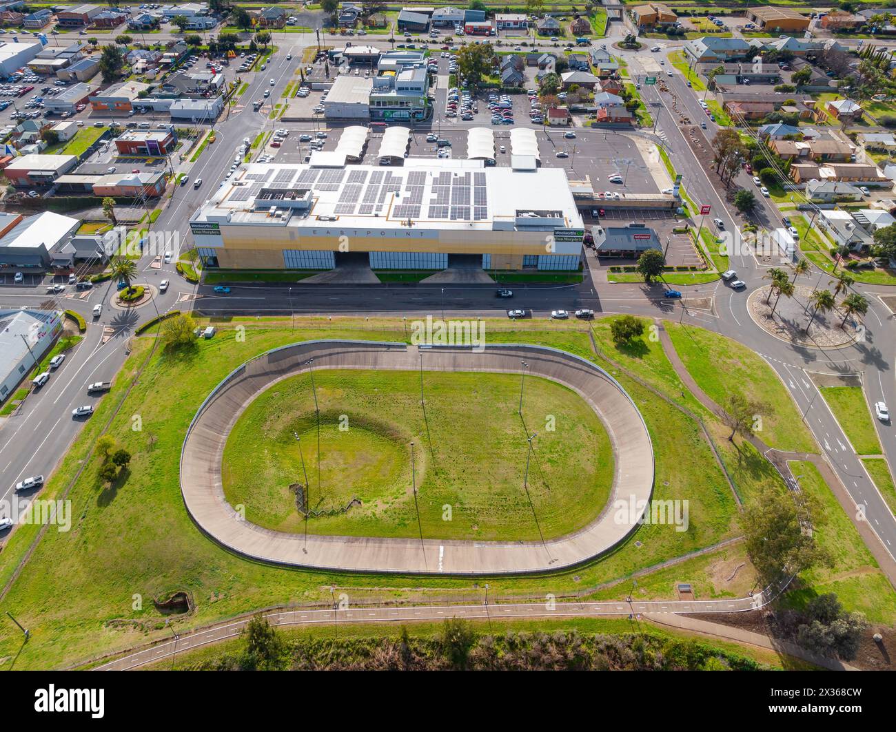 Aerial view of a velodrome alongside of a warehouse in the regional town of Tamworth in New South Wales, Australia. Stock Photo