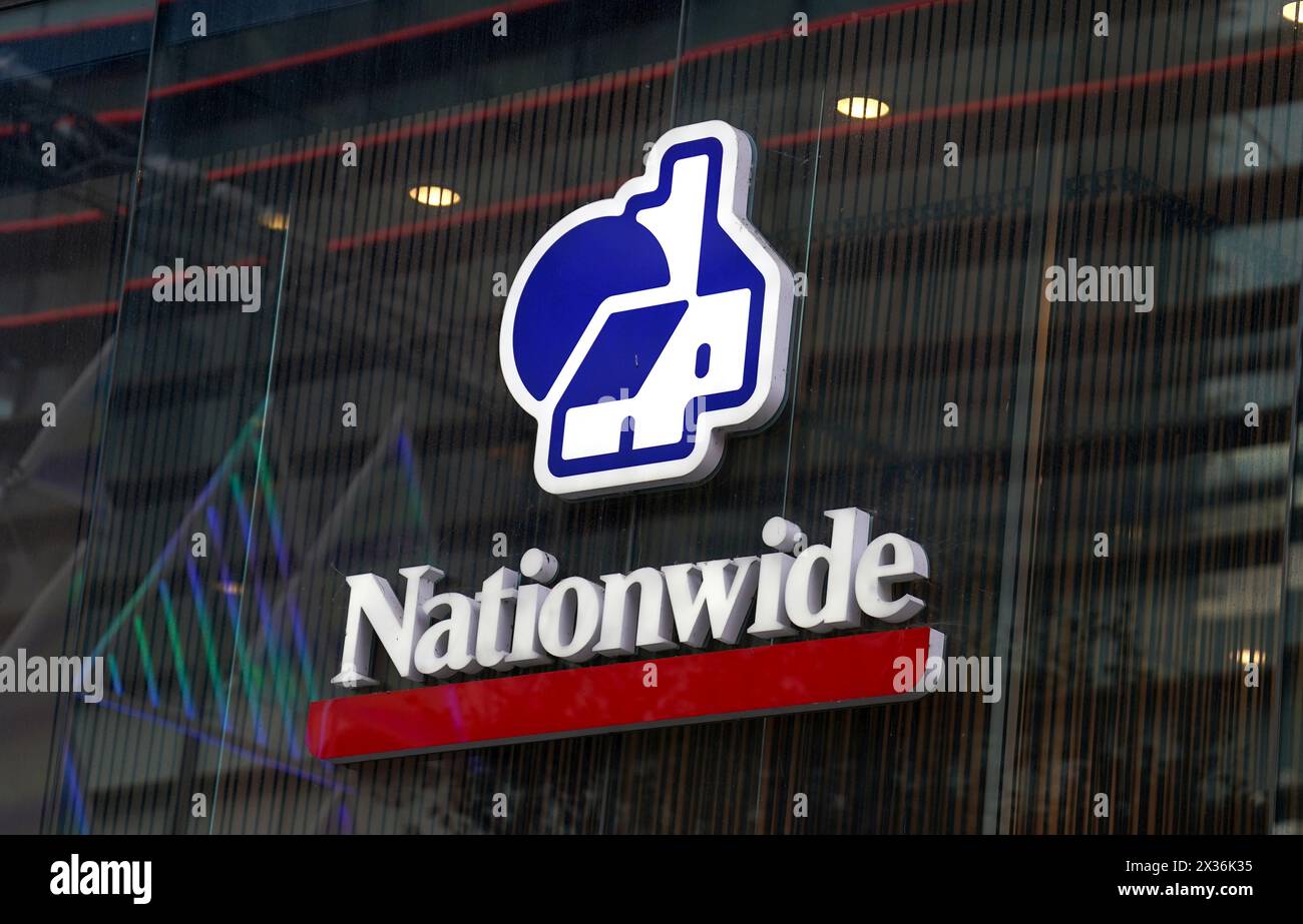 File photo dated 17/12/23 of a Nationwide Building Society sign in London, UK. Nationwide Building Society, Barclays and Lloyds Bank made the biggest gains through customers using the Current Account Switch Service (Cass) in the final quarter of 2023, industry figures indicate. Between October 1 and December 31, Nationwide made 163,363 net gains in terms of full account switches. Issue date: Thursday April 25, 2024. Stock Photo