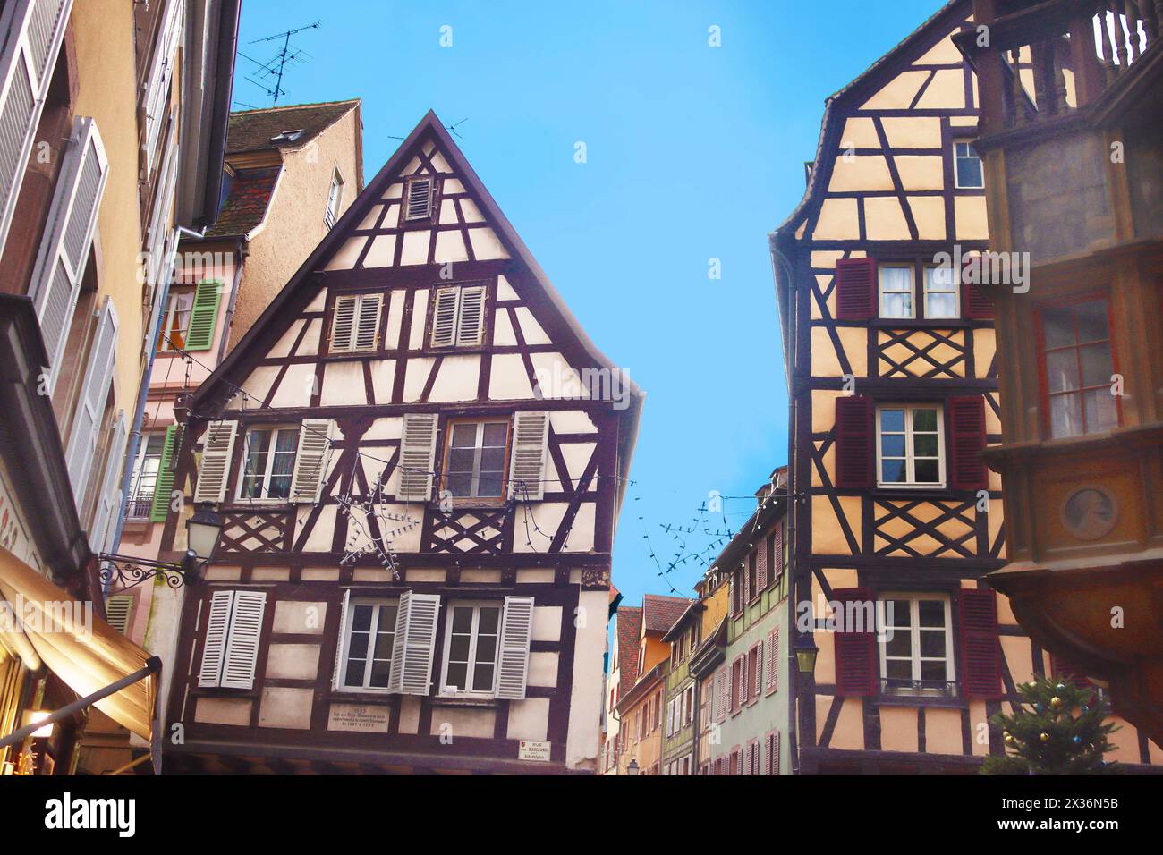 Colmar, France - December 21, 2023: Alsasian buildings and building Pfister - right (1537) Stock Photo
