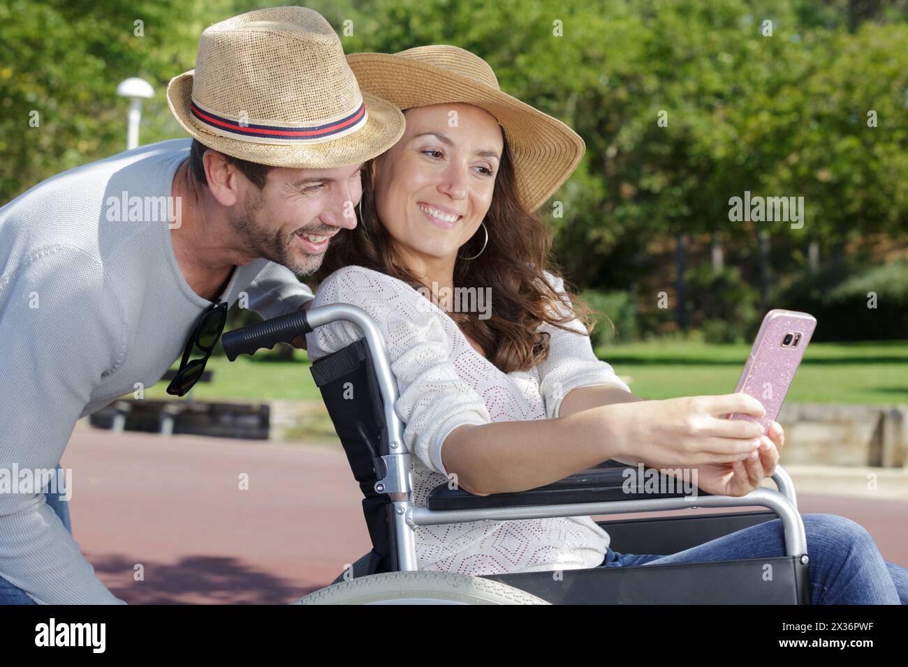 disabled woman with husband taking selfie photos Stock Photo - Alamy