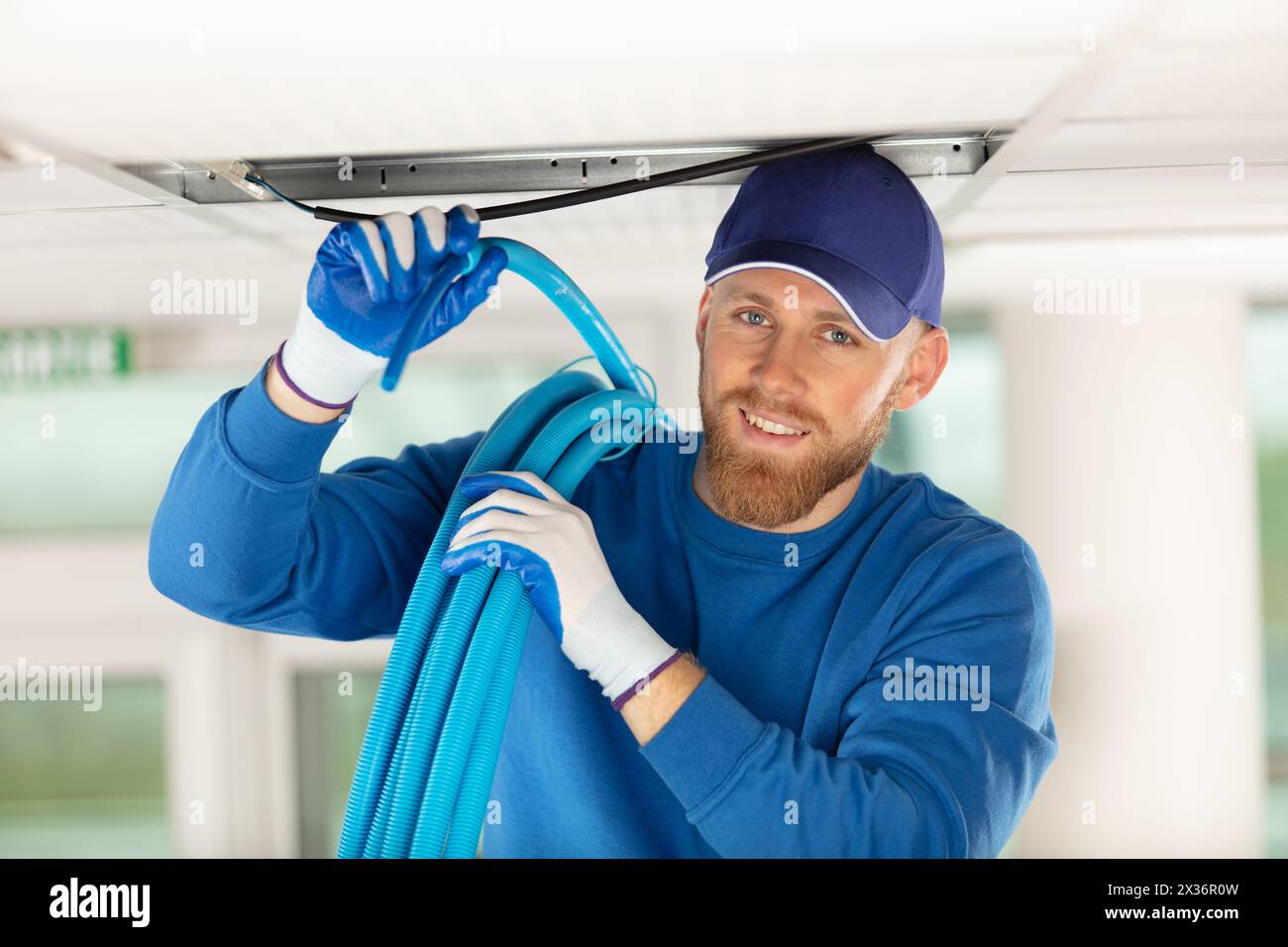 checking air ducts in a home hvac system Stock Photo