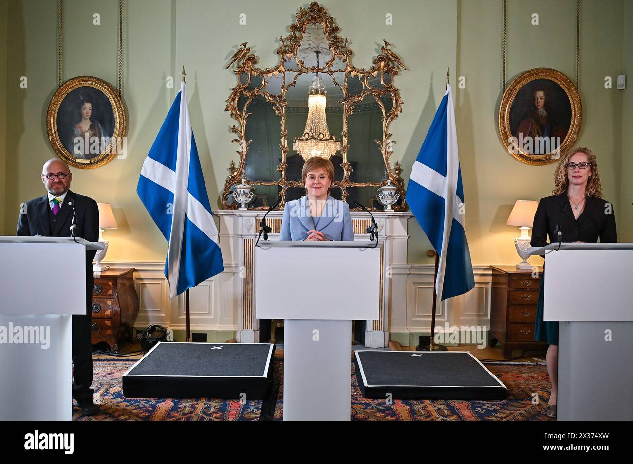 File photo dated 25/04/24 of the then First Minister Nicola Sturgeon (centre) and Scottish Green Party co-leaders Patrick Harvie (left) and Lorna Slater (right) at Bute House, Edinburgh, after the finalisation of an agreement between the SNP and the Scottish Greens to share power in Scotland. The powersharing deal between the SNP and Scottish Greens at Holyrood has been brought to an end, it is understood. Issue date: Thursday April 25, 2024. Stock Photo