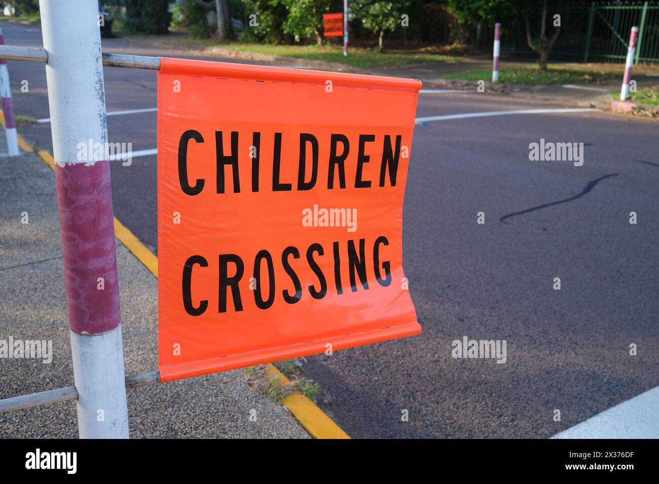 Children Crossing sign flag Stock Photo