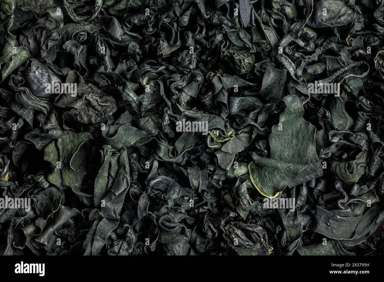 Dried wakame seaweed. Top view. Pattern Stock Photo