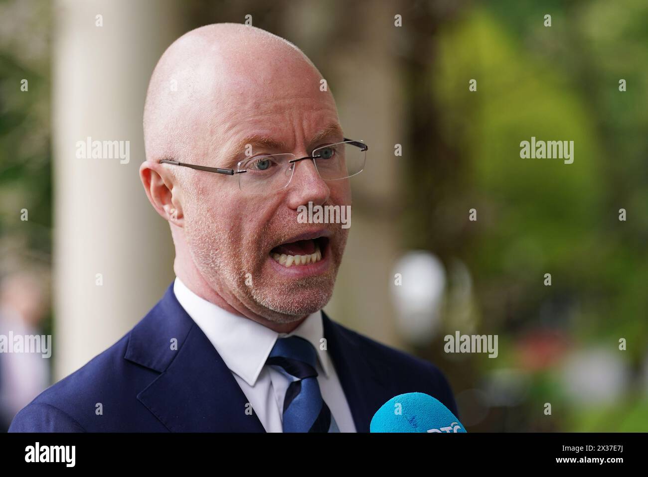 Minister for Health Stephen Donnelly speaking to media as he attends the Joint Euro-American Forum on Cancer at Farmleigh House, Dublin. Picture date: Thursday April 25, 2024. Stock Photo