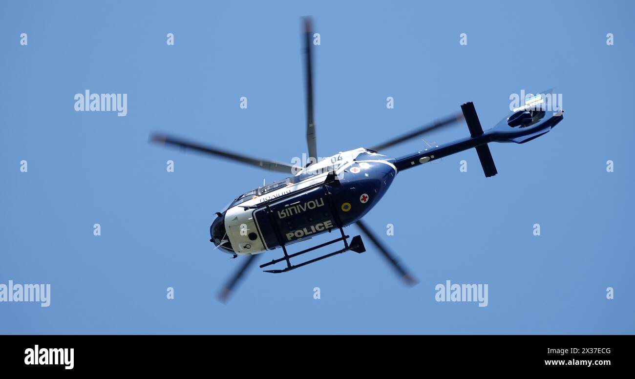 Kyiv, Ukraine April 10, 2024: Police helicopter H145 (4X-BMP) patrols ...