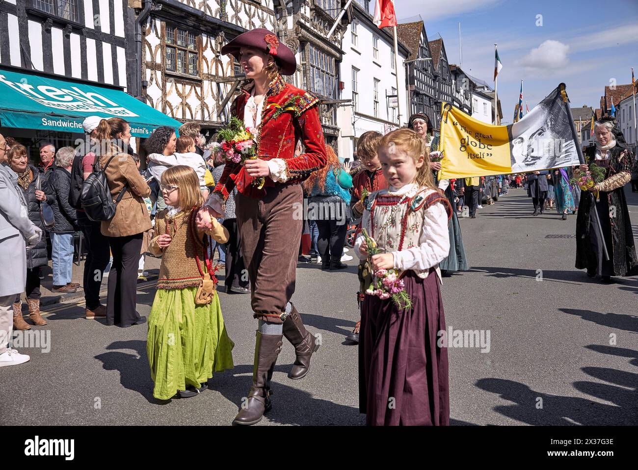 Shakespeare celebration parade with local people dressed in traditional Tudor costume 2024 Stratford upon Avon, England UK Stock Photo