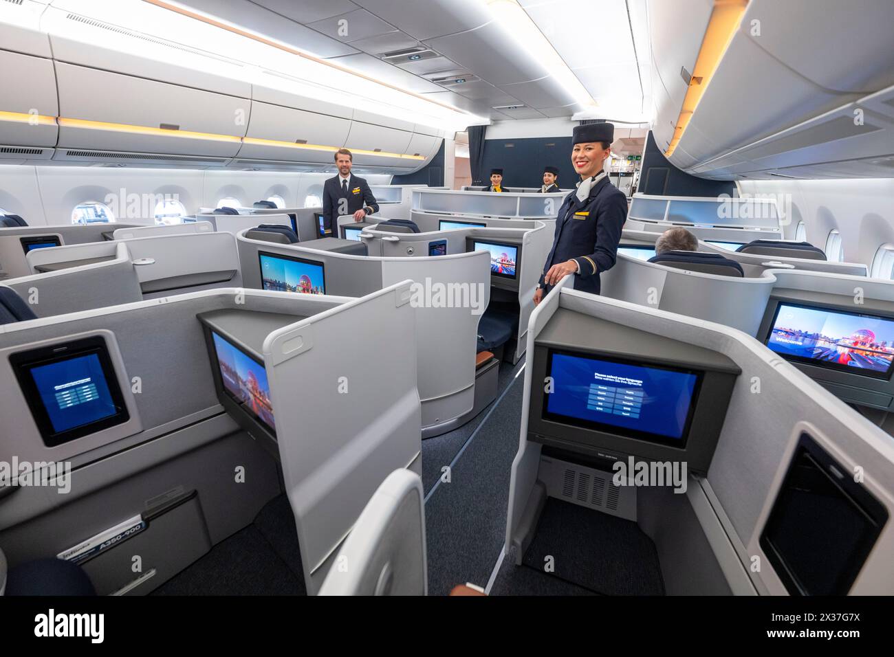 Munich, Germany. 25th Apr, 2024. Lufthansa cabin crew stand in the ...