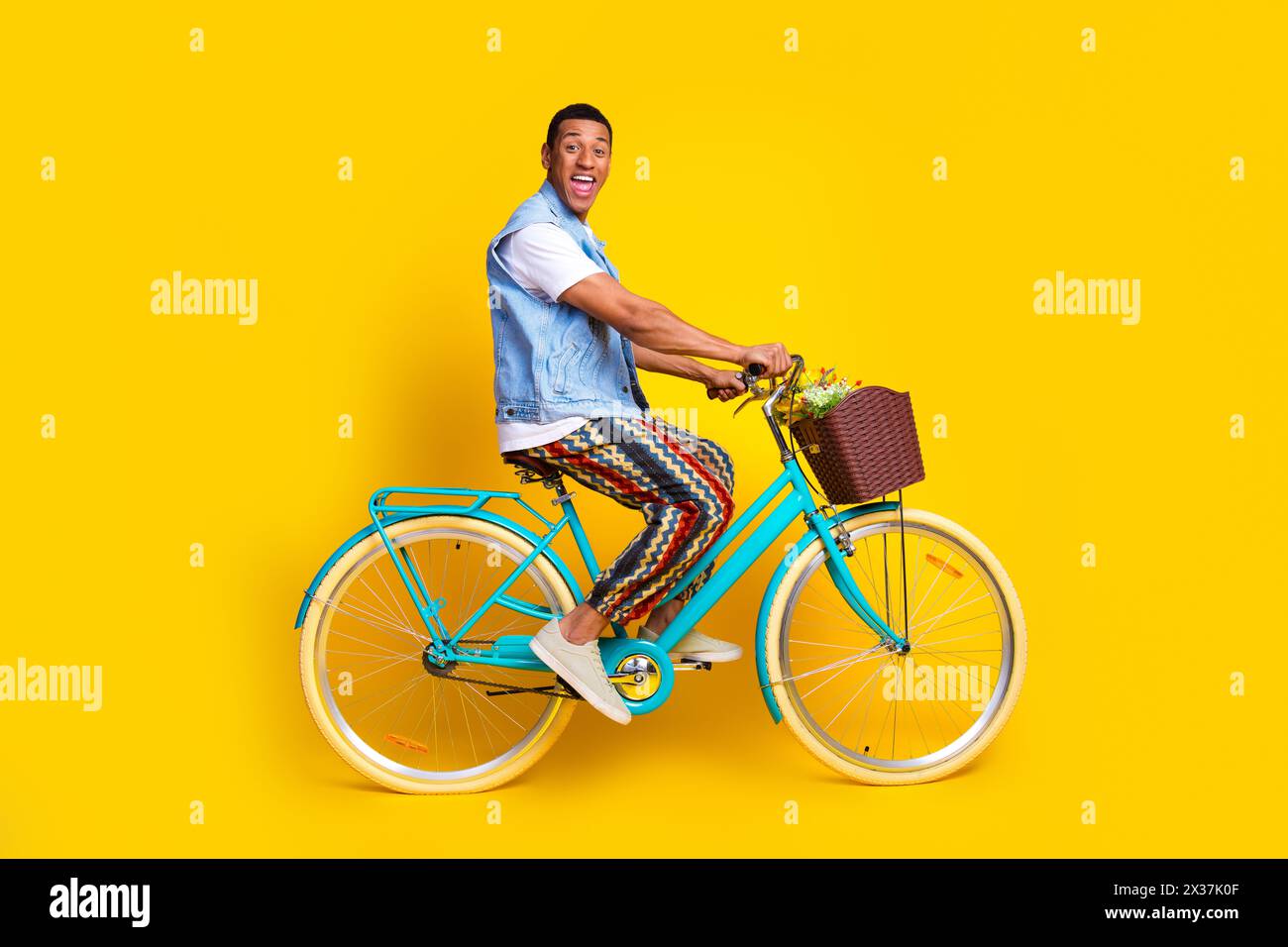 Full size photo of ecstatic man dressed denim vest over tshirt riding