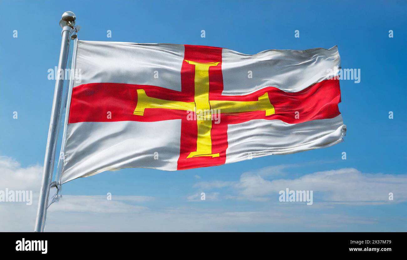 Die Fahne von Isle of Guernsey, Großbritannien, flattert im Wind Stock Photo