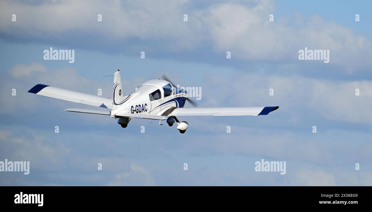 Light aircraft are used as utility aircraft commercially for passenger and freight transport, sightseeing, photography, and other roles. Stock Photo