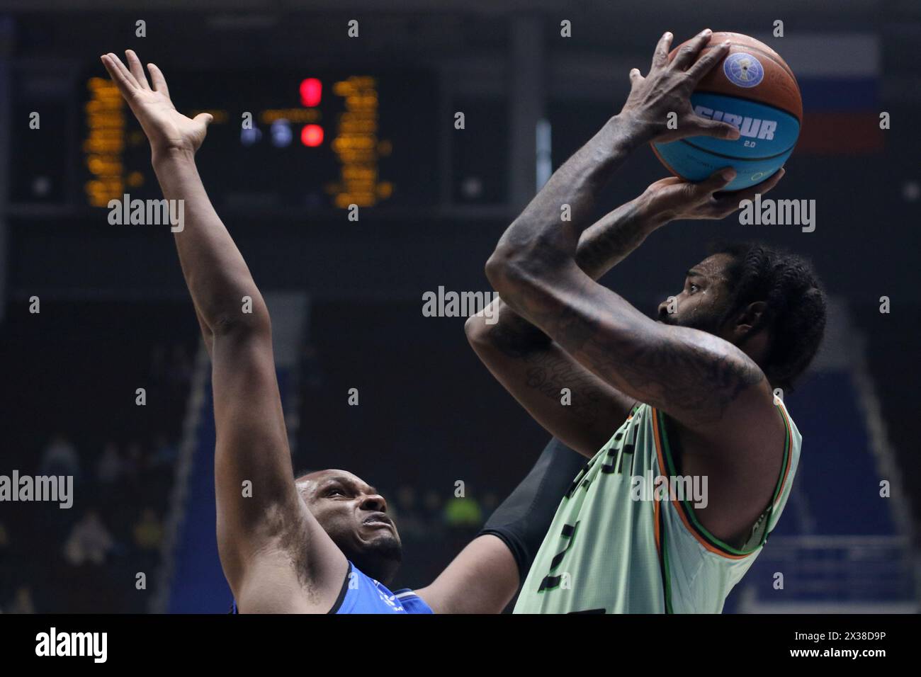 Saint Petersburg, Russia. 24th Apr, 2024. Octavius Ellis (2) of Uralmash and Josh Carlton (L) of Zenit in action during the VTB United League basketball match, The second match of the 1/4 finals of the VTB United League, between Zenit Saint Petersburg and Uralmash Yekaterinburg at 'kck Arena'. Final score; Zenit 82:74 Uralmash. The score in the series; Zenit 2:0 Uralmash. Credit: SOPA Images Limited/Alamy Live News Stock Photo