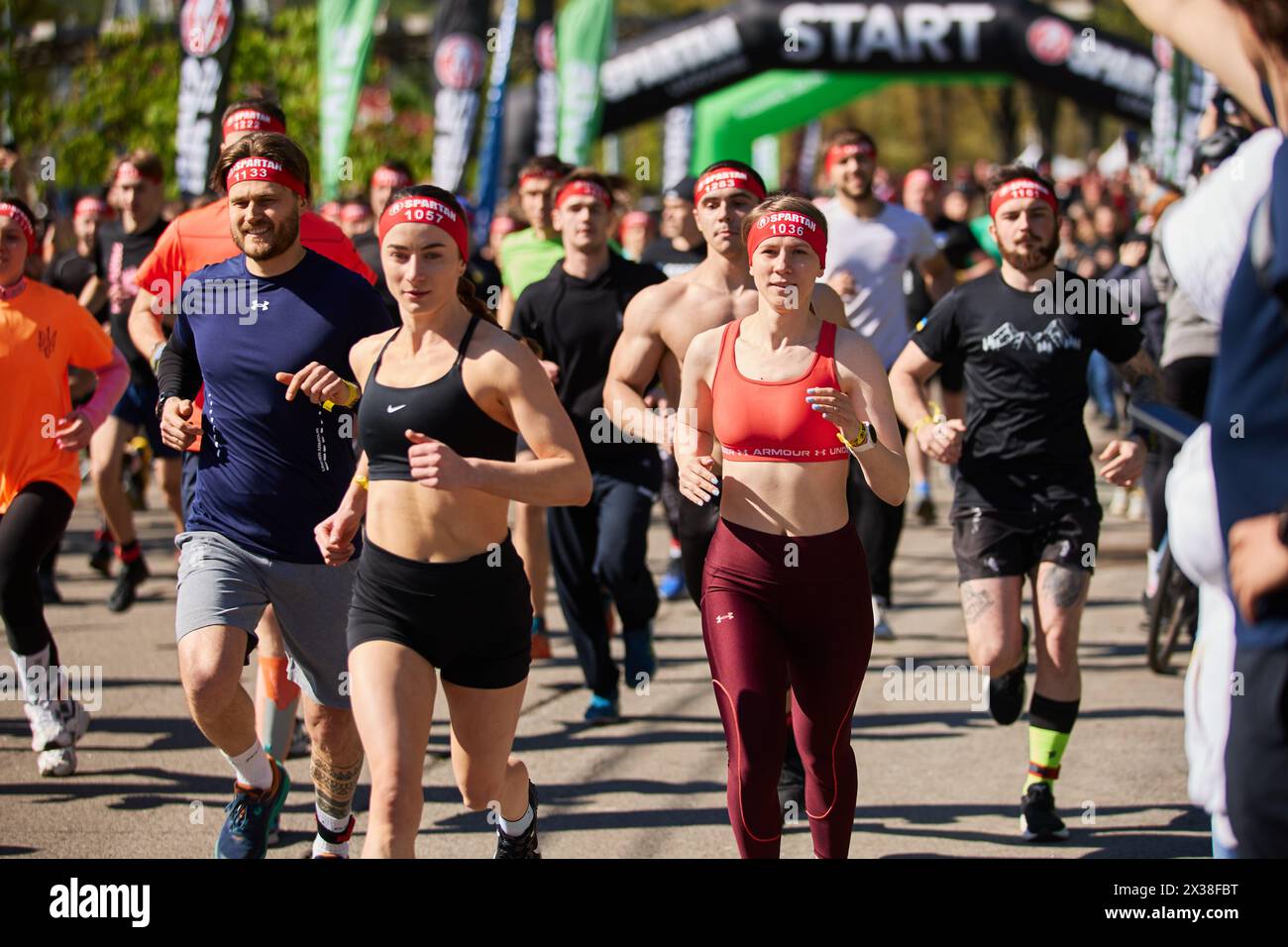 Group of strong and healthy Ukrainian runners running the marathon at