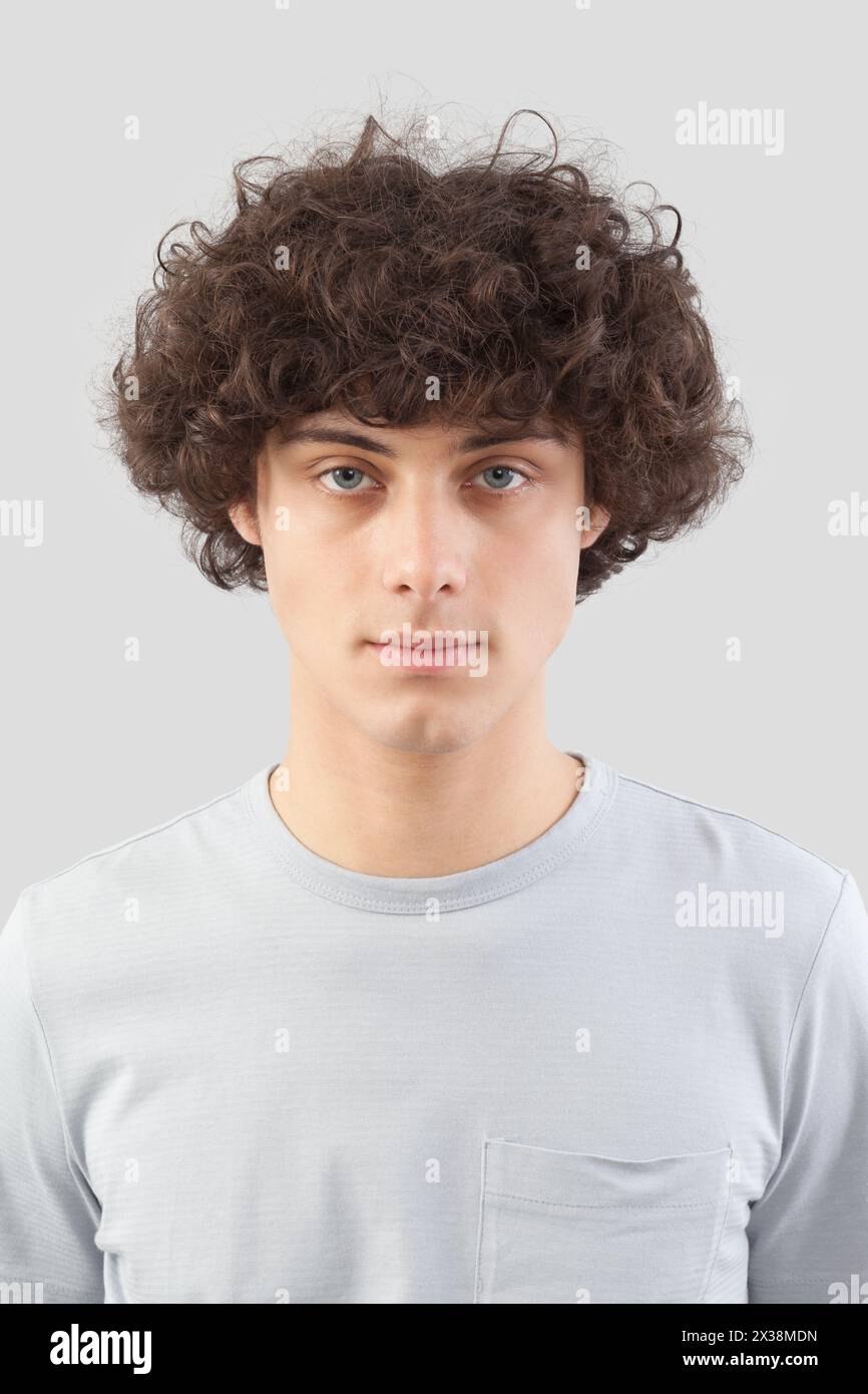 Curly hair man blue eyes hi-res stock photography and images - Alamy, image size:866x1390