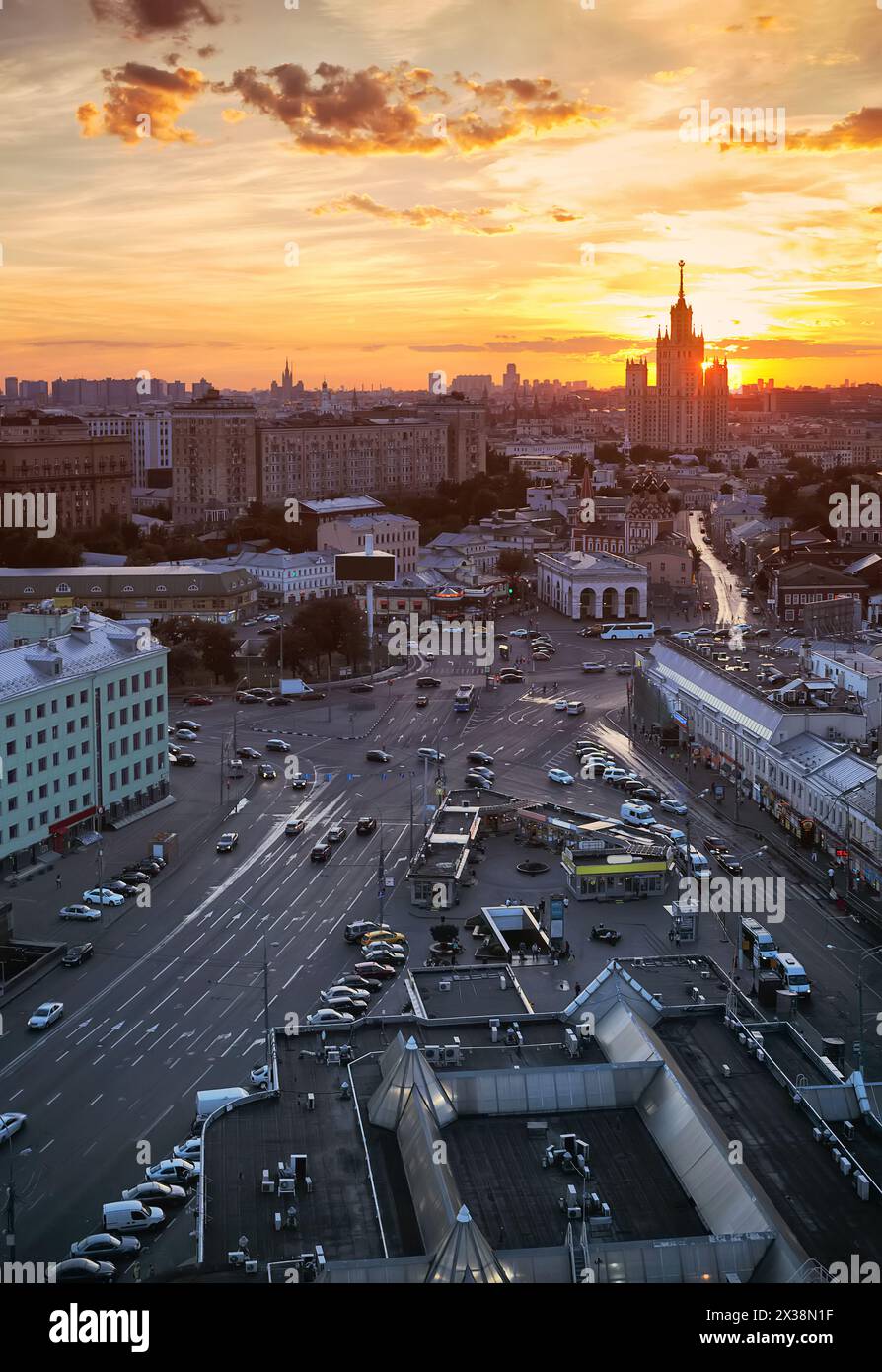 Square, road, panorama of city with stalin skyscraper during sunrise in Moscow, Russia Stock Photo