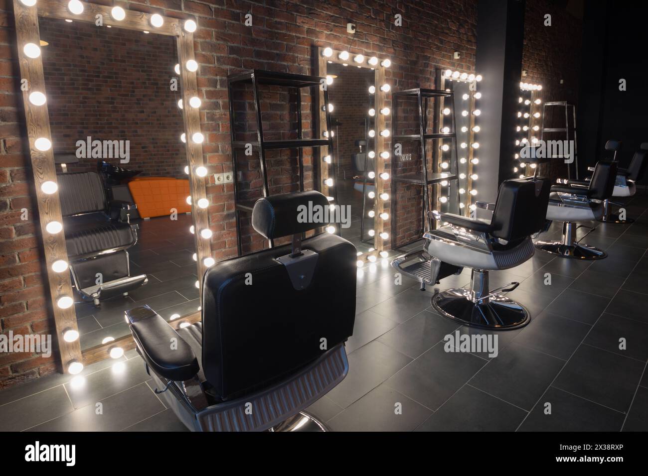 Barbershop room with places for hairdresser and make-up artist work ...