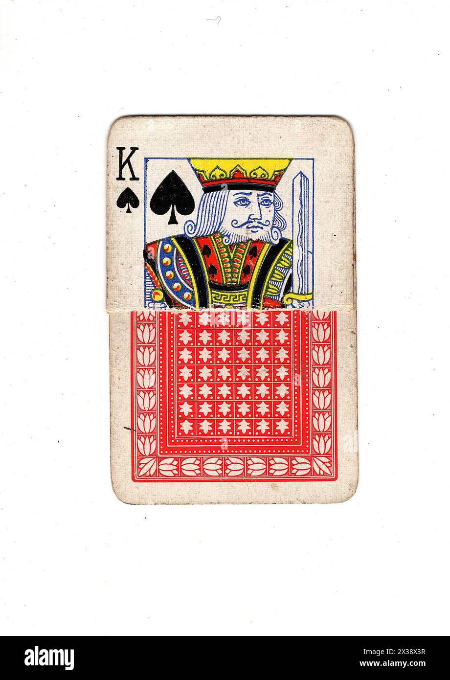 Spade Back A torn king of spades vintage playing card showing the front and back ...