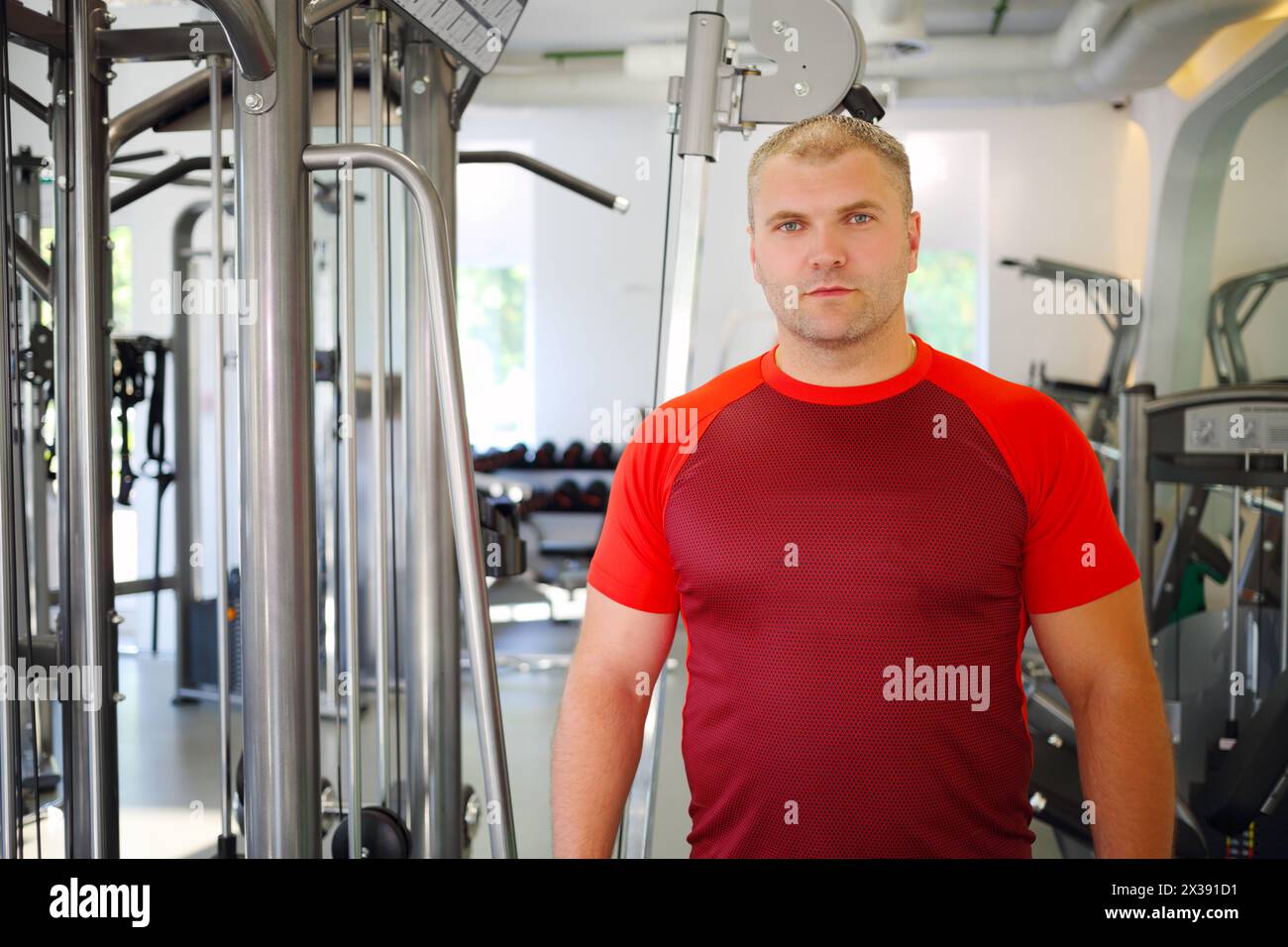 Muscular young man stands hi-res stock photography and images - Alamy