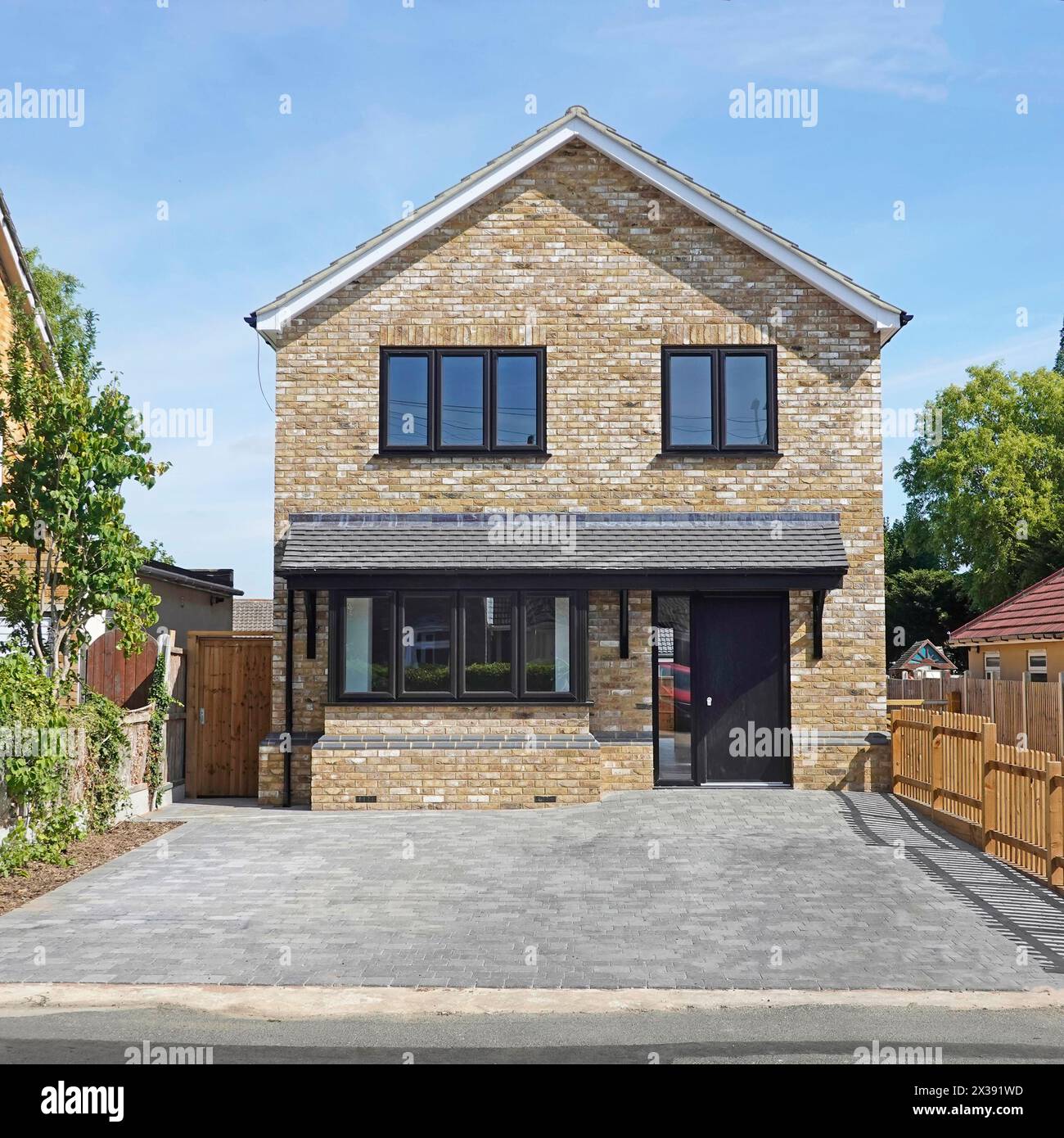 Last in a series of 40+ stages of builders work on new infill detached house now completed and up for sale ready for a customer to move in England UK Stock Photo