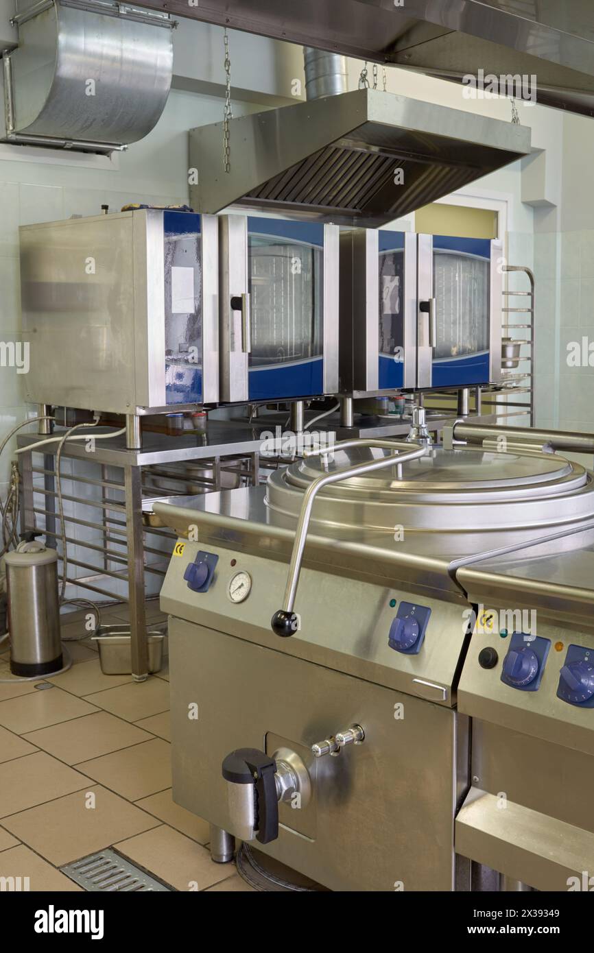 Kitchen room with modern electrical equipment in restaurant Stock Photo ... - Electrical System Setup For Restaurants