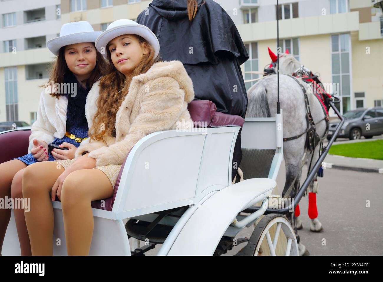 Two girls with hats hi-res stock photography and images - Alamy