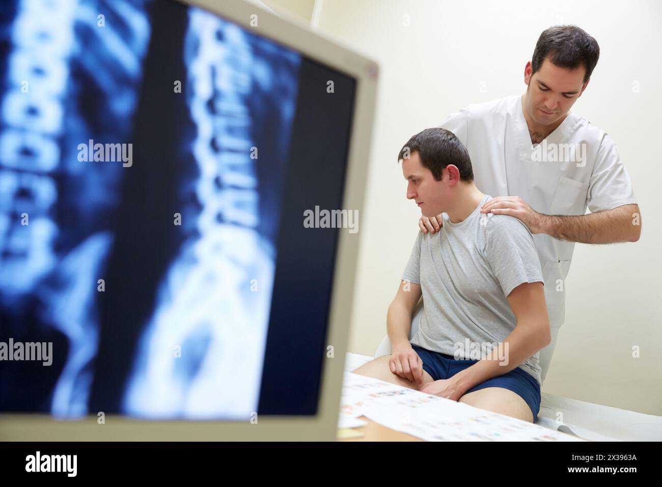 Passive Back Rotation Rotation and passive flexion back X-ray image of the spinal column ...
