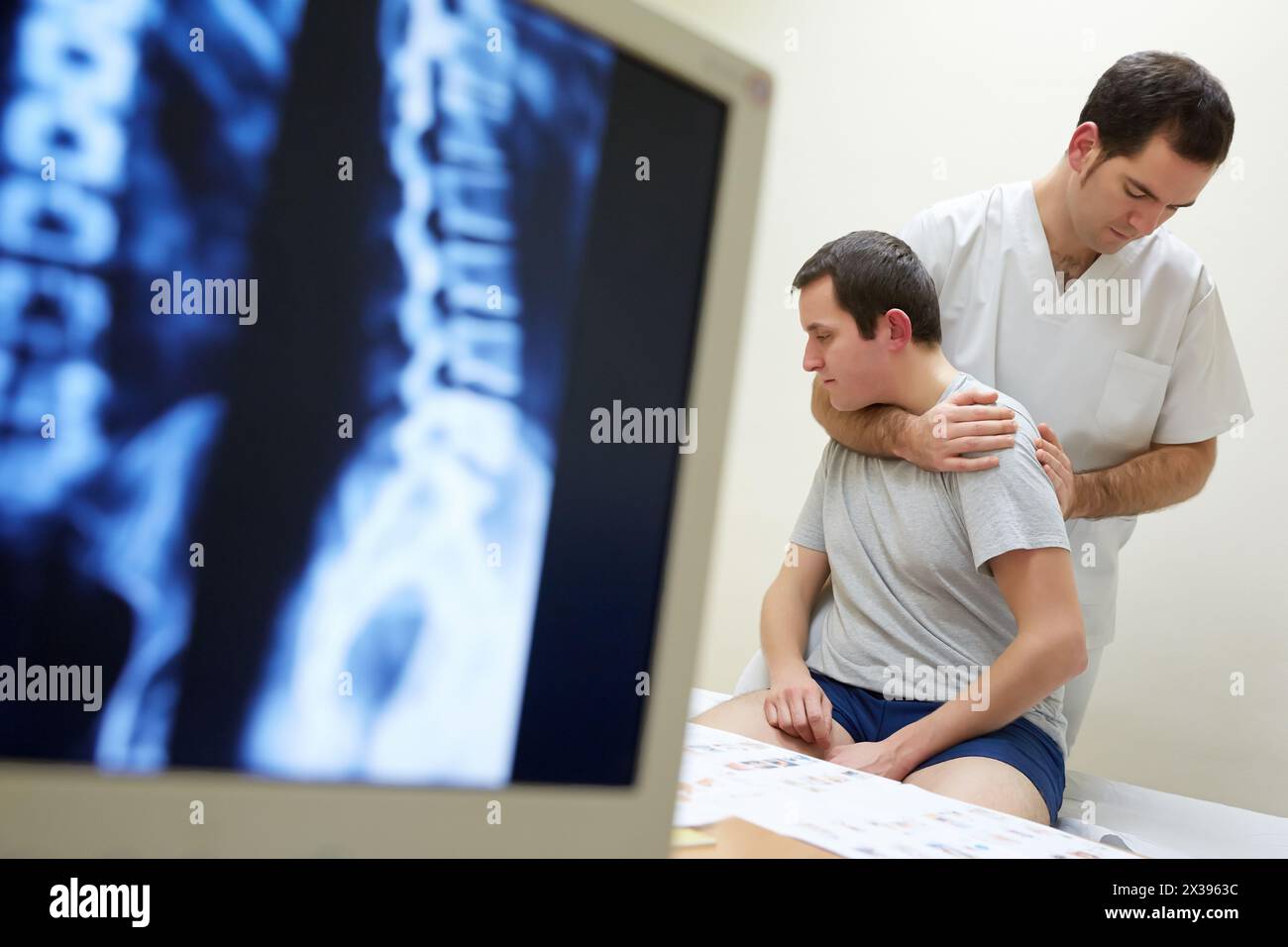 Rotation and passive flexion back X-ray image of the spinal column Physiotherapy medical center, Donostia, San Sebastian, Gipuzkoa, Basque Country, Stock Photo