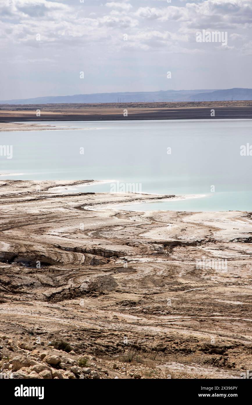 salt and mineral deposits in the dead sea is the lowest point on earth at 400 feet below sea level in jordan Stock Photo