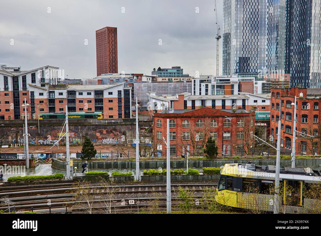 Deansgate Metrolink tram stop with Deansgate Square tower blocks behind Stock Photo