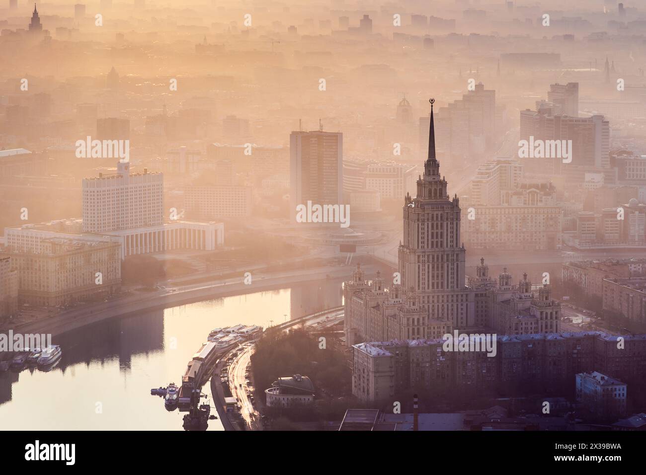 Sunrise in the foggy day over Moscow. Hotel Ukraine, Moskva river, building of Russian Government Stock Photo