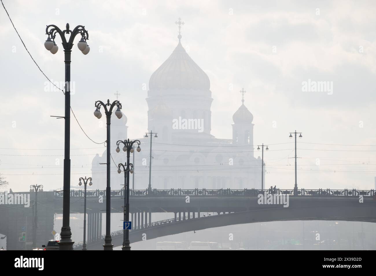 Patriarchal bridge, lanterns, Christ Savior Cathedral in fog in Moscow, Russia Stock Photo