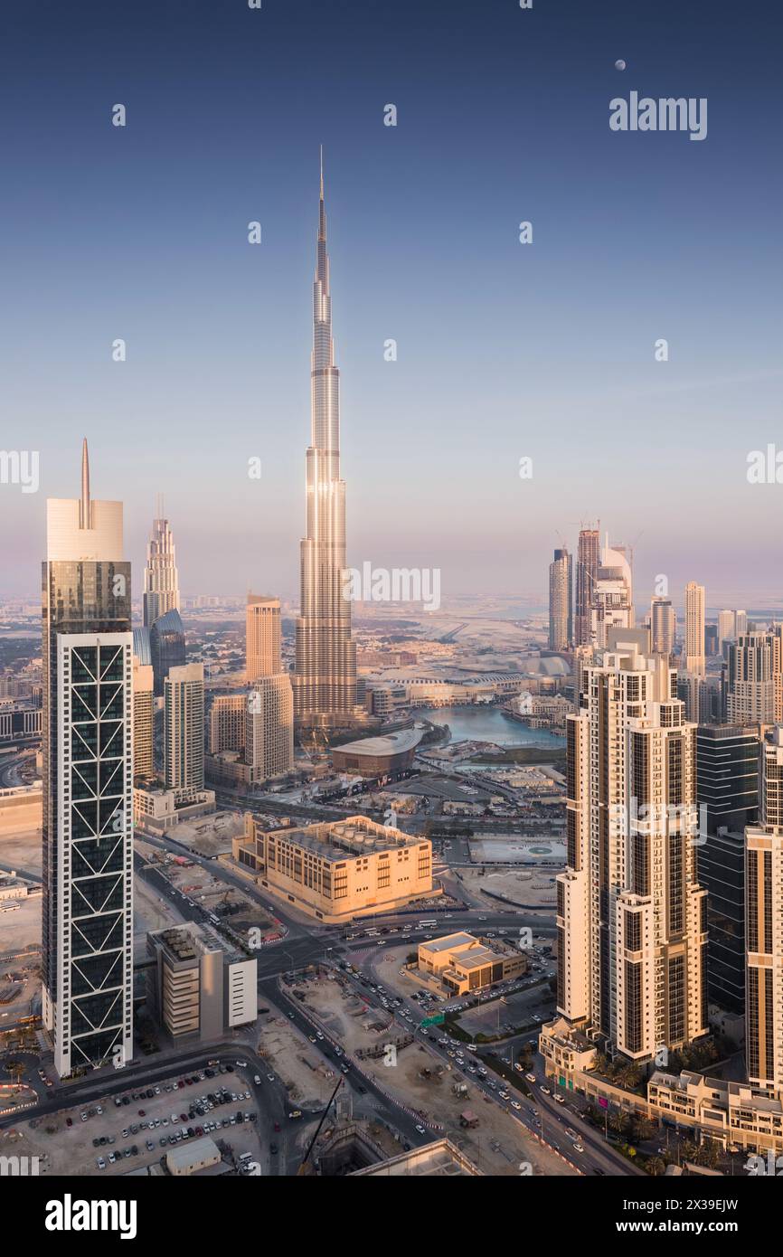 DUBAI, UAE - JAN 9, 2017: Evening Millenium Tower and Burj Khalifa, Executive Towers, Burj Khalifa - skyscraper in height of 828 meters in Dubai, tall Stock Photo