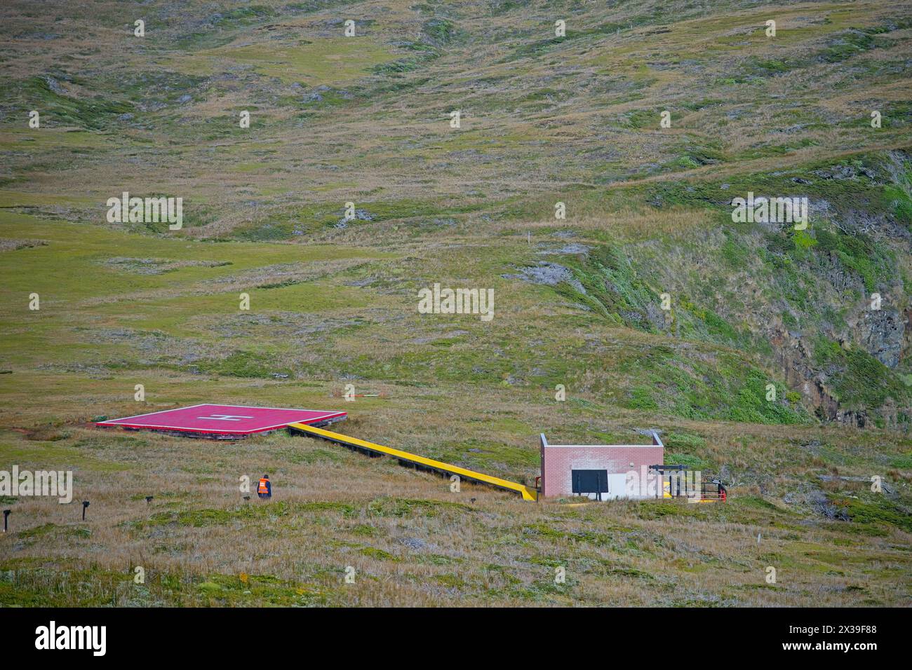 A Helecopter landing pad on Cape Horn to supply naval officer stationed and his family at the lighthouse during bad sea conditions Stock Photo