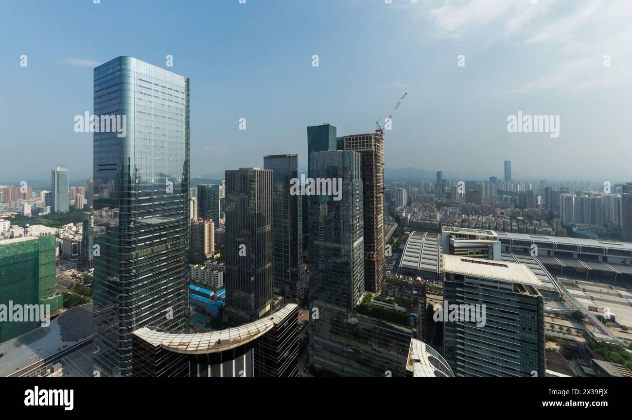 CHINA, SHENZHEN - AUG 27, 2015: City skyscrapers, view from Futian Road, According to UN, Shenzhen (with 10 million people) is among top five cities i Stock Photo