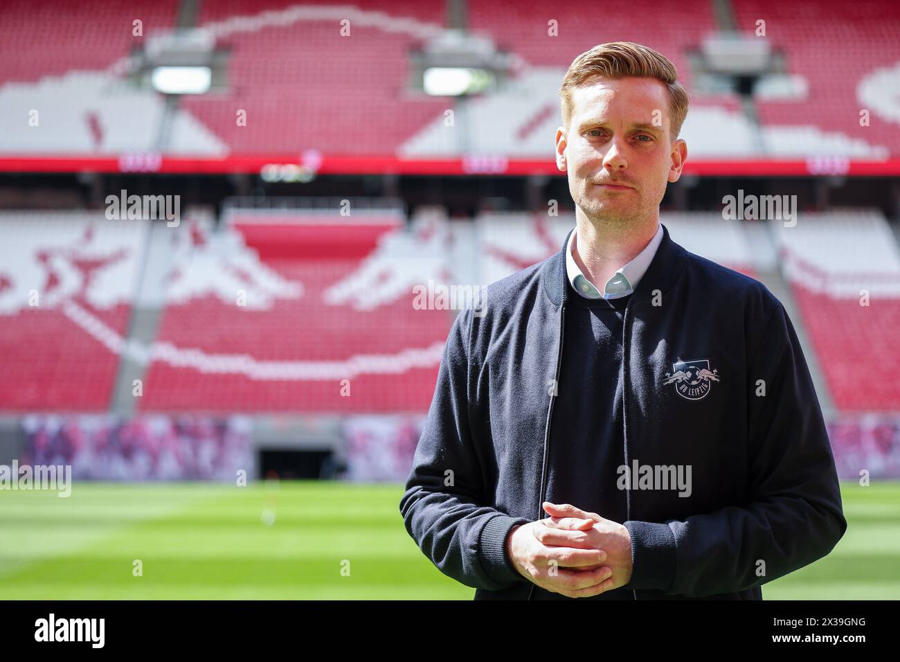 25 April 2024, Saxony, Leipzig: Soccer: Bundesliga, Johann Plenge, Managing  Director of RB Leipzig, stands in the Red Bull Arena. RB Leipzig is  breaking new ground in its preparations for the coming