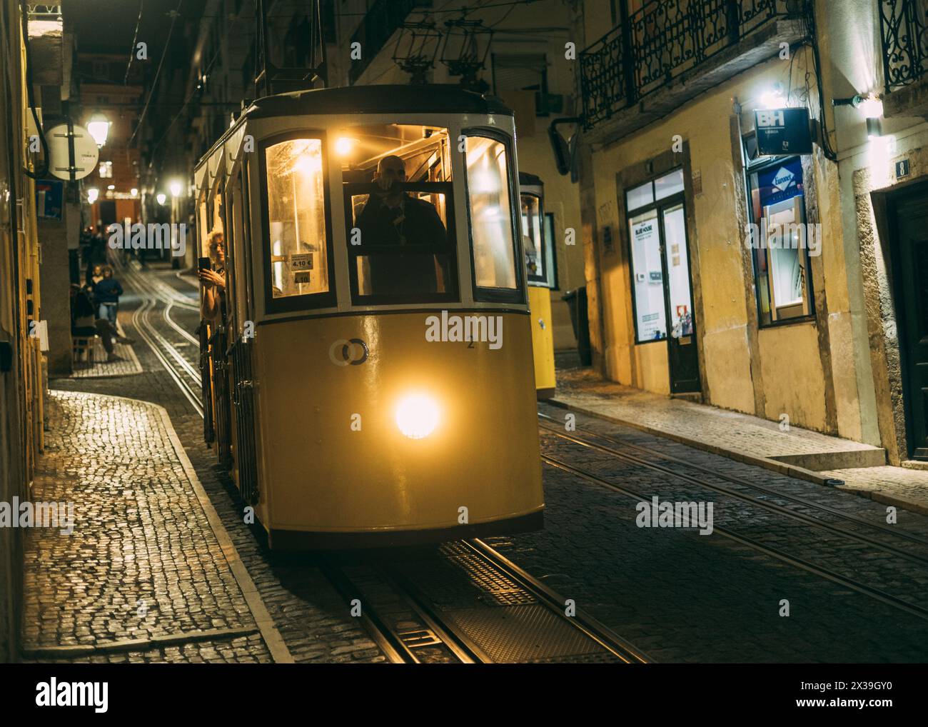 Lisbon, Lissabon, 22.03.2024: Travelpictures Lisbon, Portugal tram Lisbon, view in summer of a stationary tram at the top end of the Elevador da Bica Stock Photo