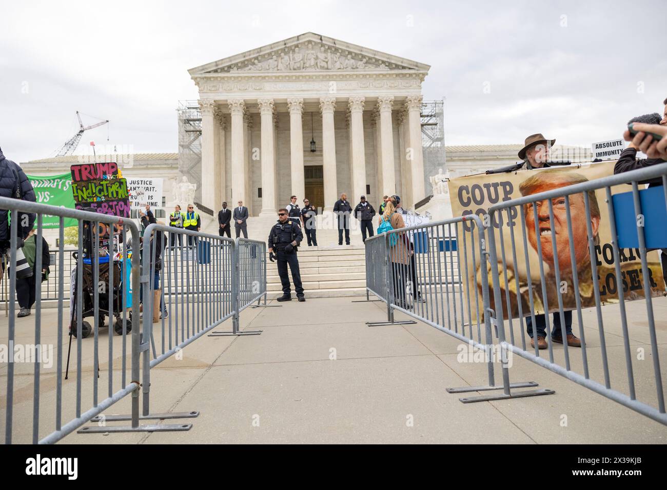 Washington, District Of Columbia, USA. 25th Apr, 2024. Protestors stand outside the United States Supreme Court Thursday, April 25, 2024 in Washington, District of Columbia. The court heard oral arguments concerning the question of presidential immunity. (Credit Image: © Eric Kayne/ZUMA Press Wire) EDITORIAL USAGE ONLY! Not for Commercial USAGE! Stock Photo