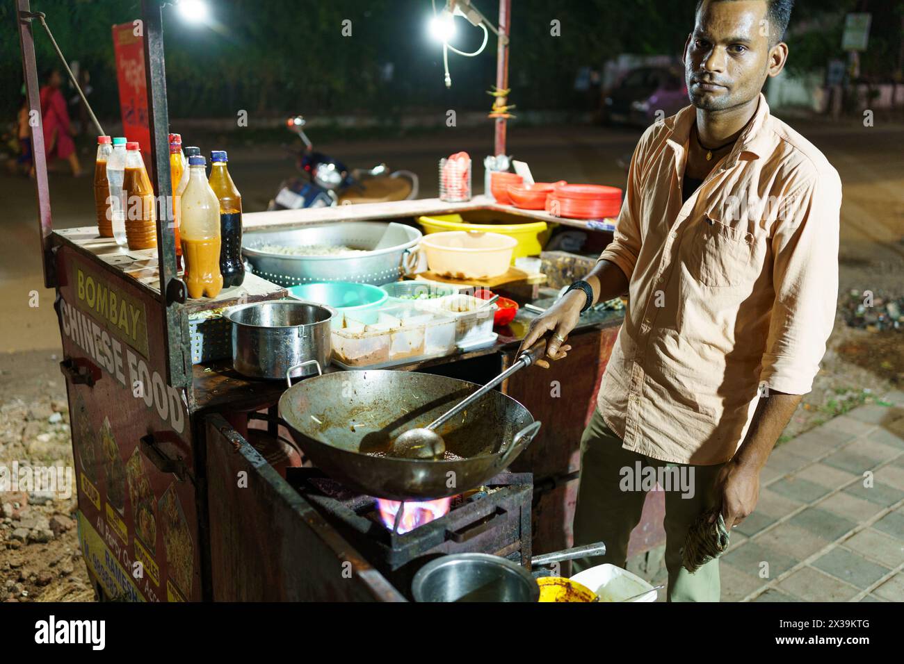 Mumbai, India - 20 October 2023: young street food vendor at a food